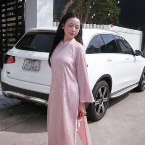 Phan Van Duc's Wife Stuns in Elegant Traditional Ao Dai Amidst Ancient Charm-1