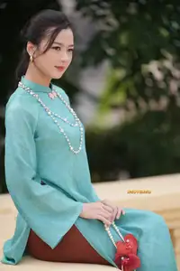 Captivating Charm: Vietnamese Girl's Elegance in a Stunning Mint Green Ao Dai-2