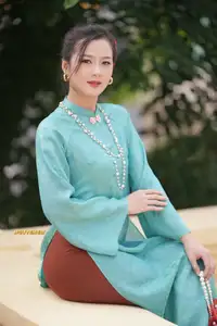 Captivating Charm: Vietnamese Girl's Elegance in a Stunning Mint Green Ao Dai-4