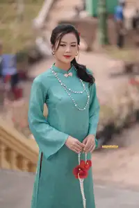 Captivating Charm: Vietnamese Girl's Elegance in a Stunning Mint Green Ao Dai-16