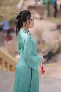 Captivating Charm: Vietnamese Girl's Elegance in a Stunning Mint Green Ao Dai-17