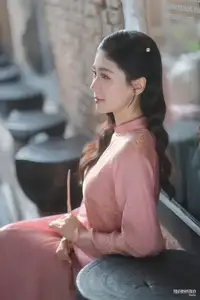 Serene Beauty of a Lady in Pink Traditional Dress with Spring Blossoms-2