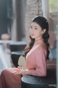 Serene Beauty of a Lady in Pink Traditional Dress with Spring Blossoms-3