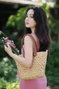 Captivating Grace: Long-Haired Beauty in Soft Pink Evokes Dreamy Serenity.-6