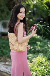 Captivating Grace: Long-Haired Beauty in Soft Pink Evokes Dreamy Serenity.-5