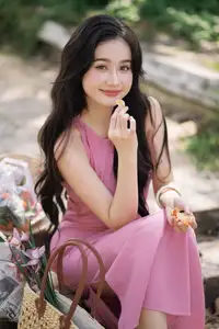 Captivating Grace: Long-Haired Beauty in Soft Pink Evokes Dreamy Serenity.-4