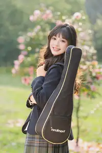 YiTuYu Vol.8694: Xia Yu Xiao Nian's Radiant Smile with Ukulele Amidst Spring Blossoms-0