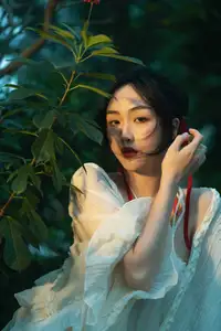 Elegant Woman in White Dress Amidst Lush Green Nature-17