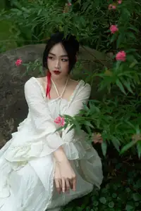 Elegant Woman in White Dress Amidst Lush Green Nature-7