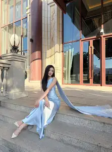 Miss Ý Nhi Radiates Elegance: A Vision in Her Sophisticated Evening Gown on Grand Ancient Stairs-3