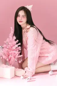 Charming Girl in Pink Sweater Embraces Cozy Christmas Style: Festive Fashion Elegance-1
