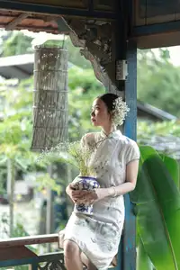 Timeless Grace: Vietnamese Woman in Modernized Ao Dai by a Serene Lotus Pond-15
