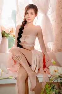 Ethereal Beauty: A Young Woman's Delicate Charm in a Flowing Pink Dress-15