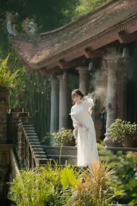 Graceful Vietnamese Girl in Traditional Attire by Ancient Architecture | Discover Asian Beauty and Cultural Charm-8