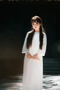 Graceful Vietnamese Girl in Traditional Attire by Ancient Architecture | Discover Asian Beauty and Cultural Charm-7