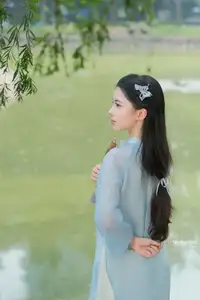 Elegant Vietnamese Maiden in Áo Dài Amidst Serene Nature's Embrace-11