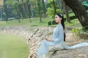 Elegant Vietnamese Maiden in Áo Dài Amidst Serene Nature's Embrace-15