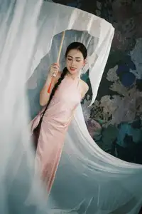 Discover Vietnamese Grace: An Elegant Girl in Ao Yem with a Red Fan.-4