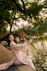 Vietnamese Ao Dai Beauty by the Lake at Sunset: Graceful Girl with Vibrant Gladiolus Flowers.-5