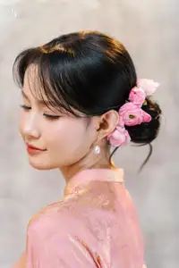 Elegant Asian Charm: Serene Young Woman in Traditional Pink Attire with Delicate Fresh Flowers-3
