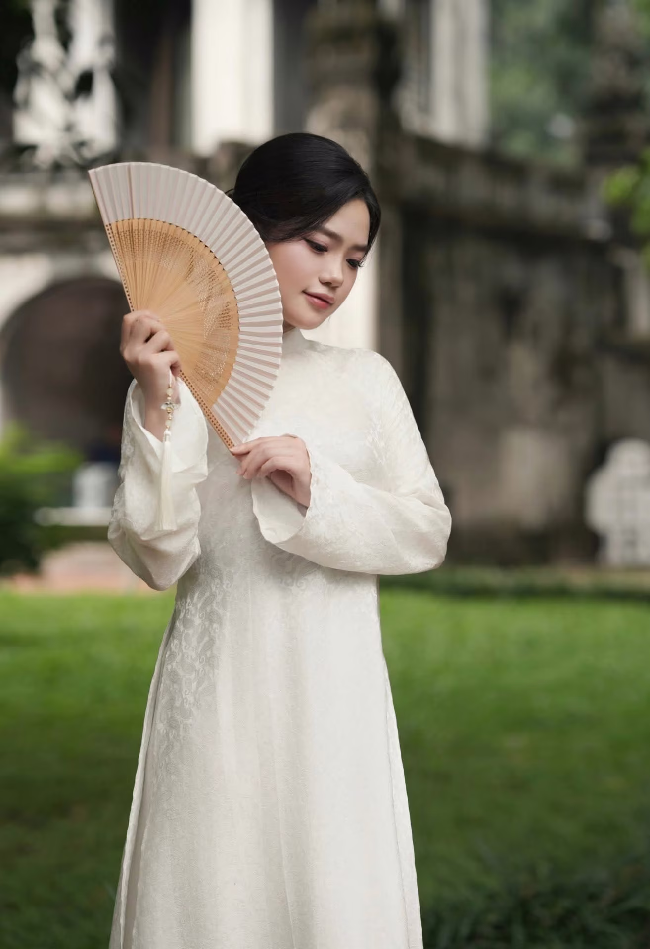 VGU No.65: Explore Vietnam's Traditional Beauty: Ao Dai Gracefully Meets Ancient Culture-0