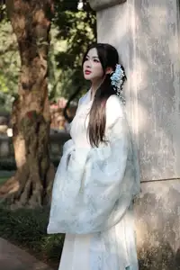 Graceful Vietnamese Girl in Traditional Attire Amidst Ancient Temple Architecture-1