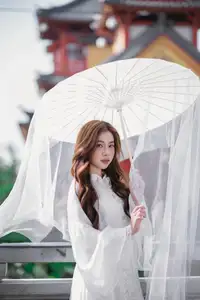 Explore Ethereal Asian Beauty: A Graceful Girl in White Ao Dai Amidst Ancient Oriental Charm-4