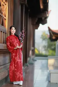 Elegant Red Ao Dai: Vietnamese Beauty with Cherry Blossoms in Ancient Architecture-4