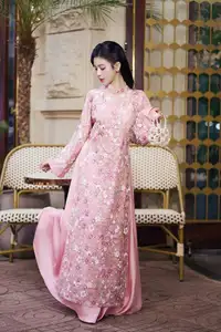 Graceful Pink Ao Dai Beauty: Elegant Vietnamese Woman with Alluring Pearl Jewelry-7