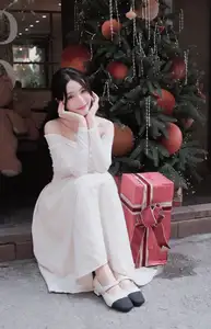 Christmas Radiance: Girl in Elegant White Dress and Joyful Smile-2