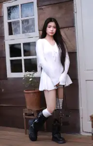 Discover the Unique Fashion Style of a Young Woman Blending Sweetness with Edgy Charm-0