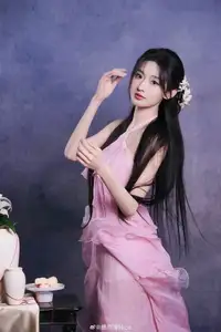 Captivating Elegance: Young Woman Prepares Ancient Herbs with Mortar and Pestle.-3