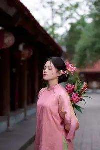 Elegant Pink Ao Dai Amidst Ancient Architecture Capturing Timeless Traditional Beauty-7
