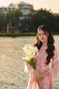 Captivating Vietnamese Beauty in Pink Ao Dai by the Lakeside at Sunset-2