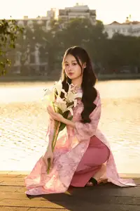 Captivating Vietnamese Beauty in Pink Ao Dai by the Lakeside at Sunset-0