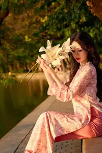 Captivating Vietnamese Beauty in Pink Ao Dai by the Lakeside at Sunset-3