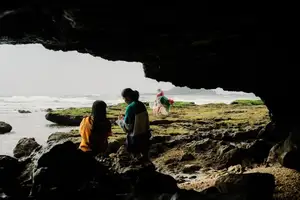 Discover Hon Do: Lush Green Moss Beach and Majestic Sea Cave, a Mesmerizing Landscape in Khanh Hoa.-0