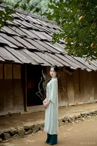 Vietnamese Grace: Elegant Portrait of a Young Woman in Lush Nature-16