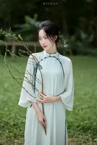 Vietnamese Grace: Elegant Portrait of a Young Woman in Lush Nature-14