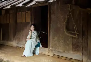 Vietnamese Grace: Elegant Portrait of a Young Woman in Lush Nature-8