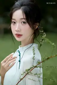 Vietnamese Grace: Elegant Portrait of a Young Woman in Lush Nature-0