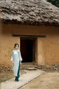 Vietnamese Grace: Elegant Portrait of a Young Woman in Lush Nature-18