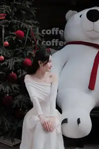 Elegant Girl in Off-Shoulder White Dress Welcoming Christmas, Showcasing Gentle Beauty and Holiday Season Style. 1000027390-3