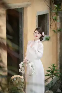 Elegant Asian Beauty: A Gentle Girl Adorned with a Pure White Orchid-8