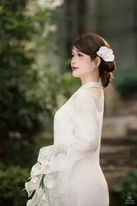Elegant Asian Beauty: A Gentle Girl Adorned with a Pure White Orchid-5
