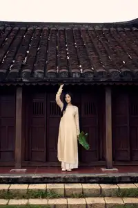 Timeless Vietnamese Beauty: Elegant Ao Dai Girl Amidst Ancient Architecture - Photo 597392964_1911130843144618_1615706383643237778_n.jpg-12