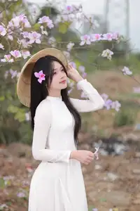 Elegant Vietnamese Student in Ao Dai Amidst Bauhinia Flowers-4