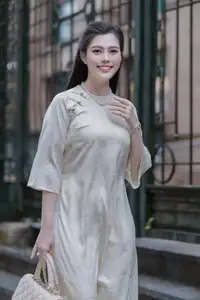 VGU No.162: Modern Ao Dai Grace: Vietnamese Woman's Elegant Style & Allure on City Streets.-2