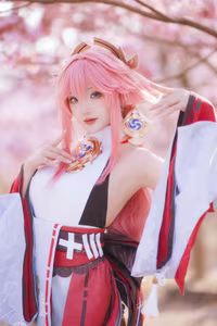 Coser Guaxi Jiang Transforms into Yae Miko Genshin Impact: Enchanting Beauty Amidst Sakura-11