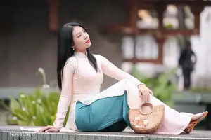 Graceful Vietnamese Lady in Traditional Ao Dai  1000024954-23